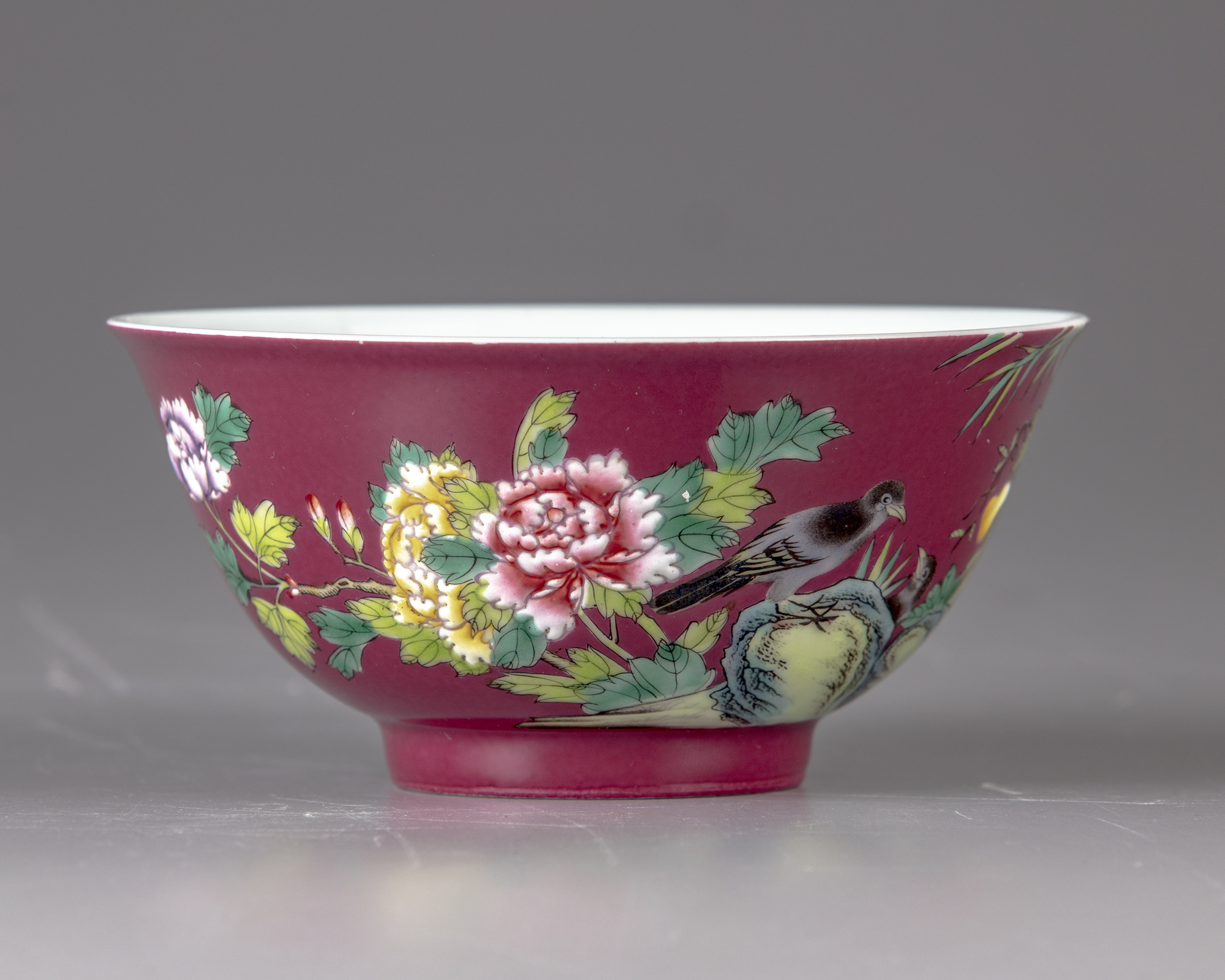 A Ruby Ground Famille Rose Bowl