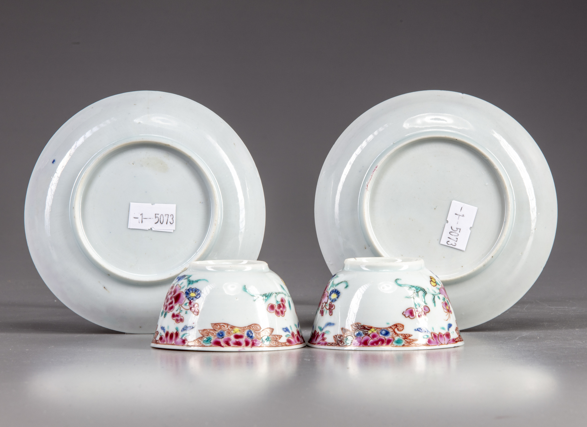 A Pair Of Famille Rose Cups And Saucers