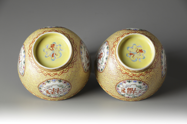 A Pair Of Coral Red And Yellow Ground Bowls With Famille Rose Decoration