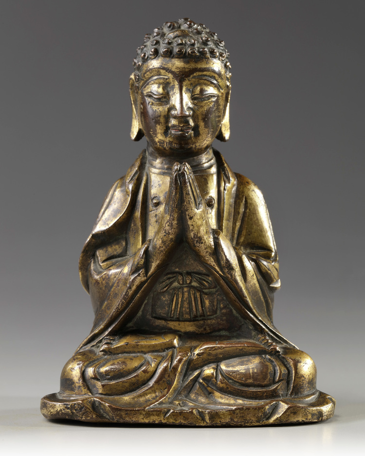 A CHINESE  GILT BRONZE FIGURE OF A BUDDHA, LATE MING DYNASTY, 17TH CENTURY