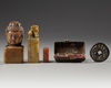 Three Chinese soapstone seals and a bronze erotic coin
