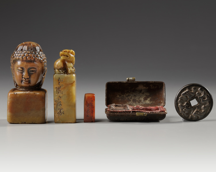 Three Chinese soapstone seals and a bronze erotic coin