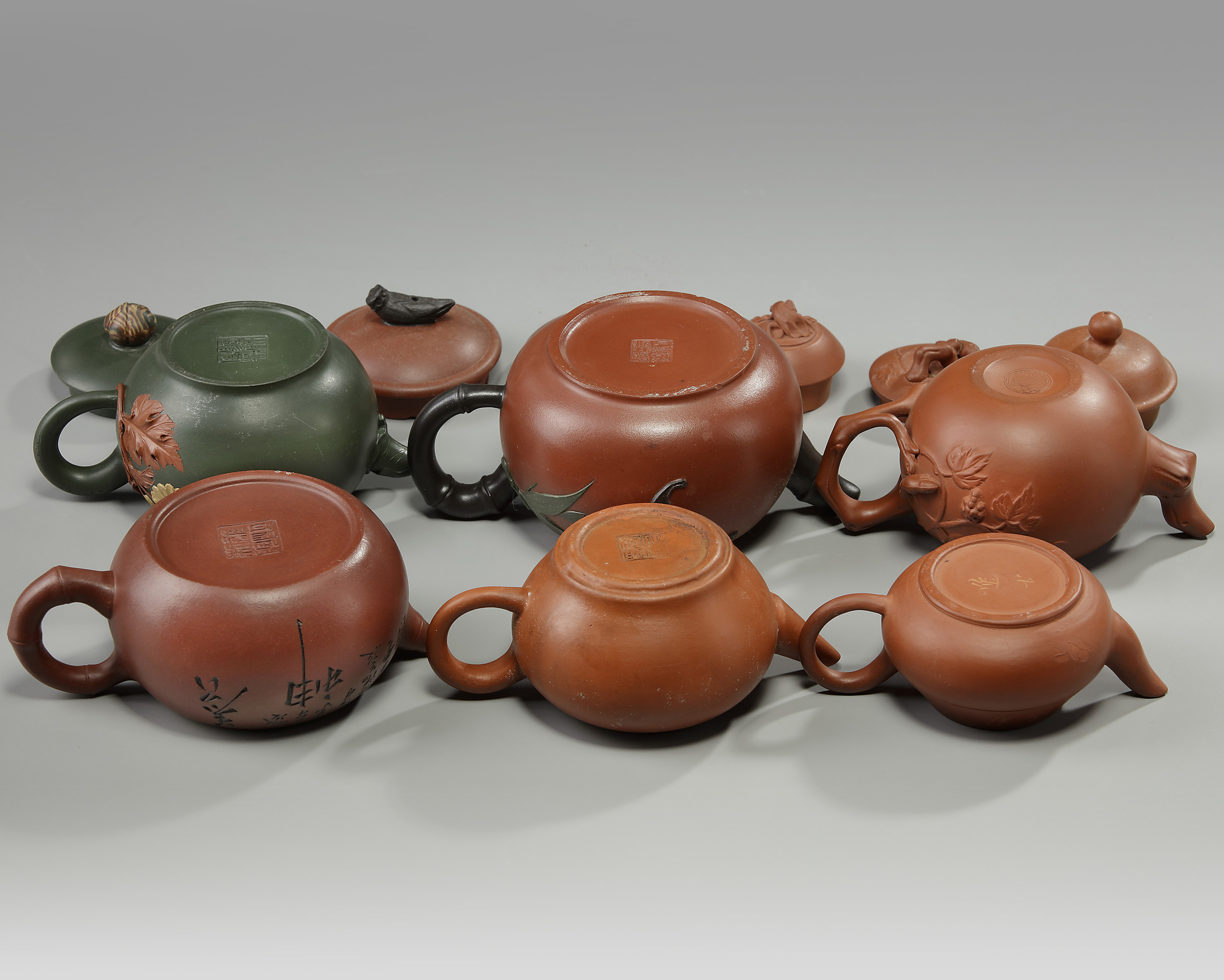 A group of six Chinese small yixing teapots