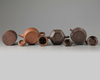 Three Chinese Yixing teapots and a Yixing brush pot