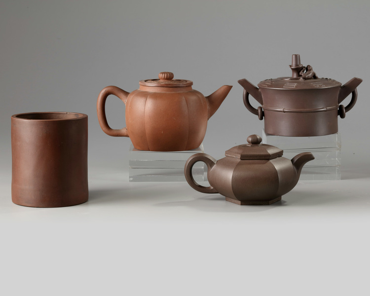 Three Chinese Yixing teapots and a Yixing brush pot