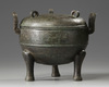 A Chinese bronze tripod ding and cover