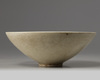 A CHINESE CREAM-GLAZED SPOTTED BOWL, QING DYNASTY (1644 - 1911)