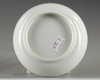 A Chinese famille rose 'bird and flower' saucer