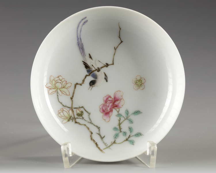 A Chinese famille rose 'bird and flower' saucer