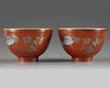 A pair of Chinese coral-red-decorated small cups