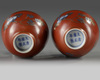 A pair of Chinese coral-red-decorated small cups