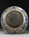 A massive Chinese yellow-glazed blue and white dragon charger