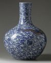 A LARGE CHINESE UNDERGLAZE COPPER RED AND BLUE AND WHITE 'DRAGON' VASE, QING DYNASTY (1644-1911)