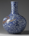 A LARGE CHINESE UNDERGLAZE COPPER RED AND BLUE AND WHITE 'DRAGON' VASE, QING DYNASTY (1644-1911)