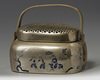 A Chinese brass 'narrative' hand warmer