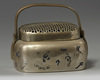 A Chinese brass 'narrative' hand warmer