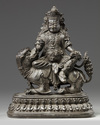 A CHINESE BRONZE FIGURE OF JAMBHALA ON A BUDDHIST LION, CHINA, 19TH-20TH CENTURY