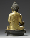 A Chinese gilt bronze figure of Shakyamuni
