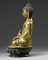 A Chinese gilt bronze figure of Shakyamuni
