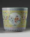 A Chinese yellow-ground famille rose 'boys' jardiniere
