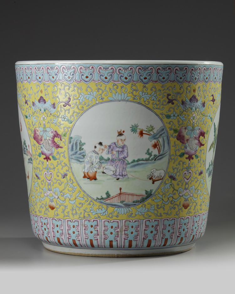 A Chinese yellow-ground famille rose 'boys' jardiniere