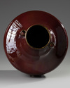 A large Chinese flambe glazed arrow vase