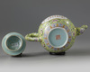 A Chinese lime-green ground famille rose teapot
