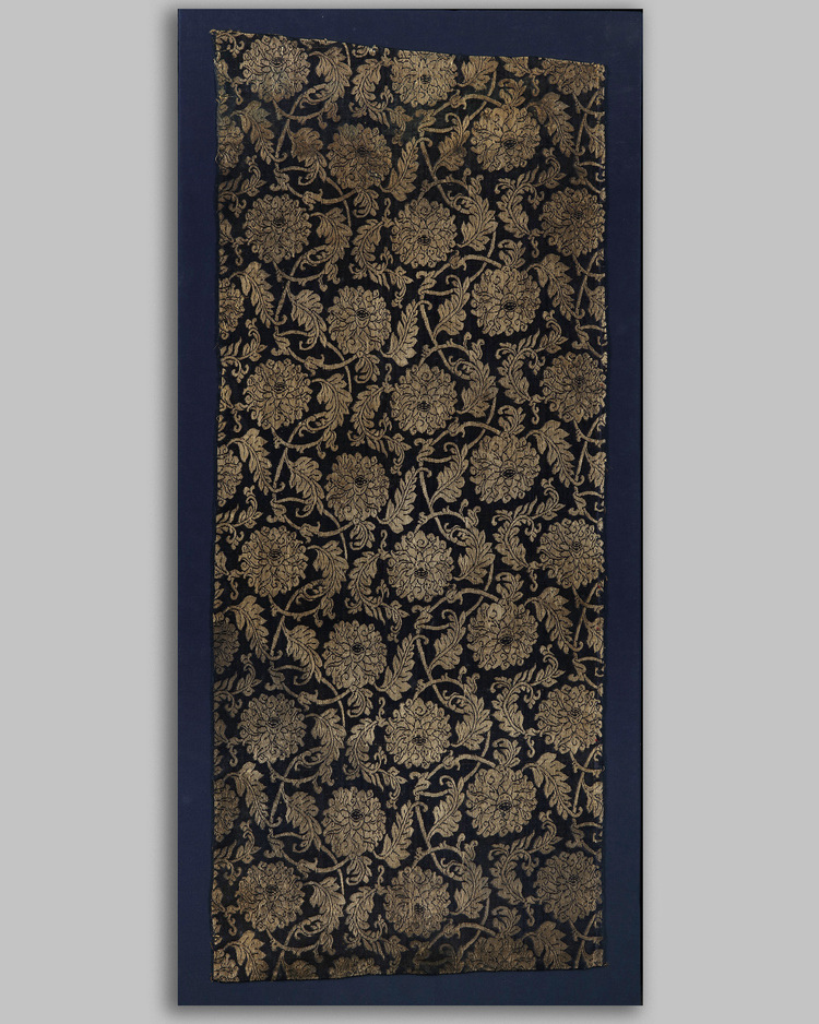 A Chinese midnight-blue-ground gilt 'scrolling lotus' brocade panel