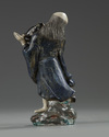 A Chinese enamelled porcelain figure of Liu Hai