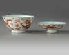 A Chinese white-ground sgraffiato iron-red-decorated 'dragon' bowl and cover