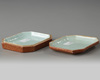 A Chinese coral-ground famille rose octagonal seal paste box and cover