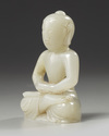 A Chinese white jade Shakyamuni