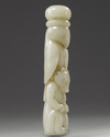 A Chinese pale celadon jade ying xiong knife hilt