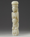 A Chinese pale celadon jade ying xiong knife hilt
