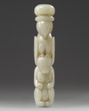 A Chinese pale celadon jade ying xiong knife hilt