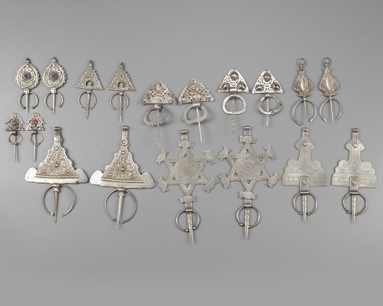 Nine pairs of Silver fibula's