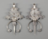 A pair of  mineral inlay fibula's
