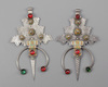 A pair of  mineral inlay fibula's