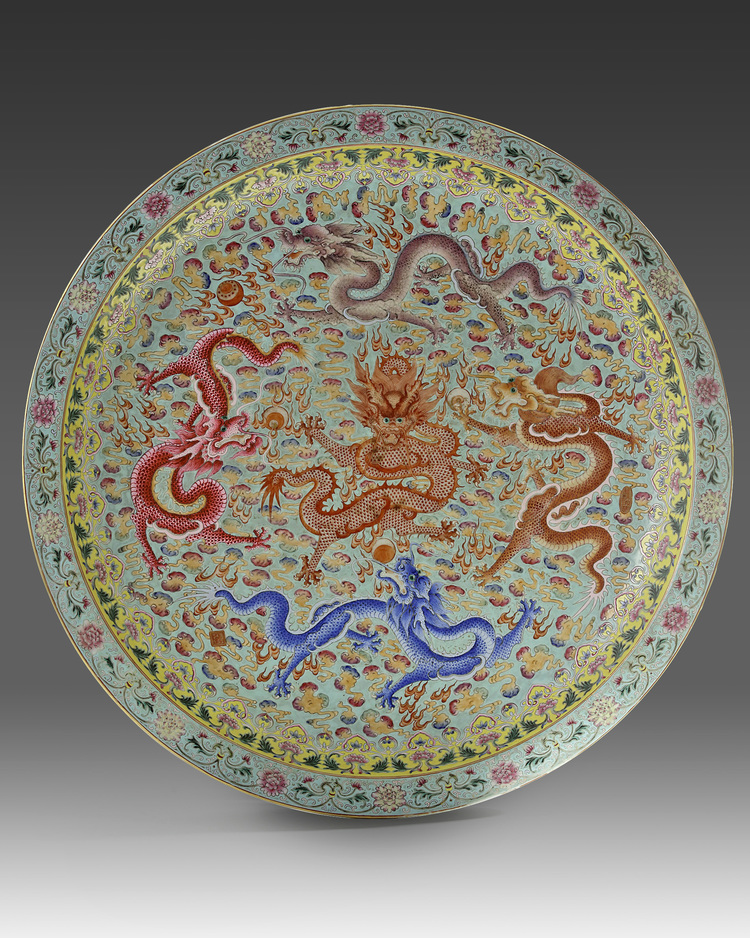 A massive Chinese famille rose 'dragon and phoenix' charger