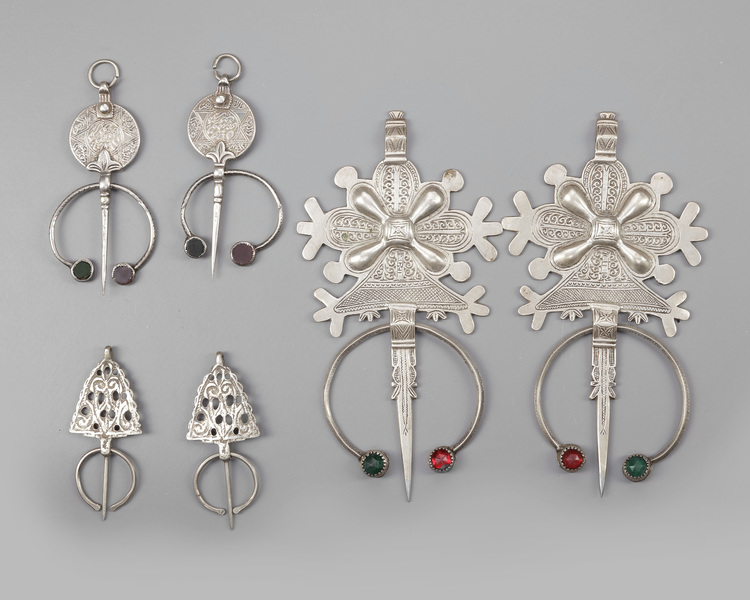 Three pair of silver fibula's