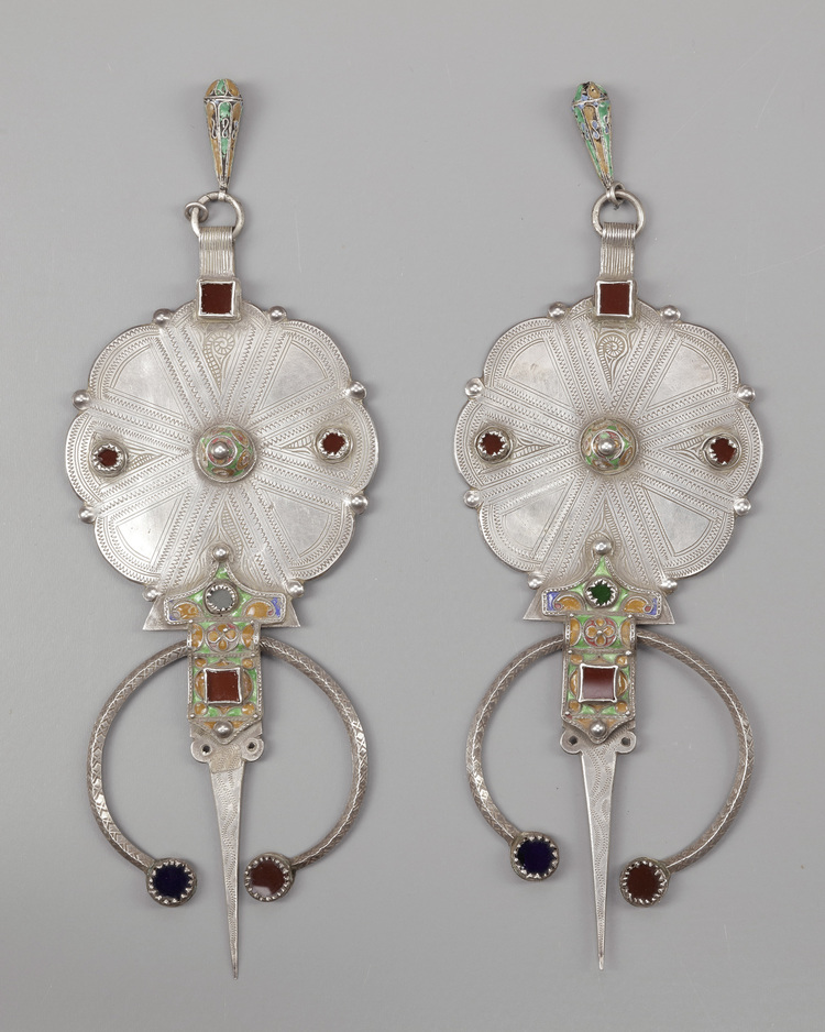 A pair of silver with mineral stone inlay fibula