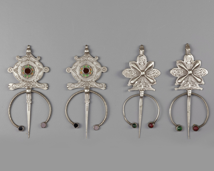 Two pair of silver fibula
