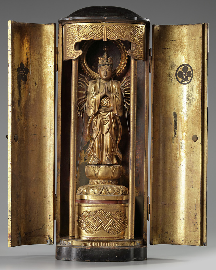 A kannon statue in a zushi shrine