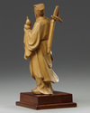 A Chinese root wood carving of an Immortal