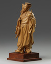 A Chinese root wood carving of an Immortal