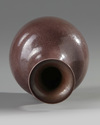A Chinese aubergine-glazed incised-decorated 'dragon' vase