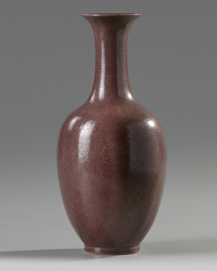 A Chinese aubergine-glazed incised-decorated 'dragon' vase