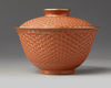 A Chinese imitation-cinnabar lacquer bowl and cover