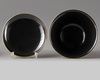 A Chinese imitation-cinnabar lacquer bowl and cover