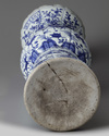 A large Chinese Ming-style blue and white 'mythical beasts' gu vase